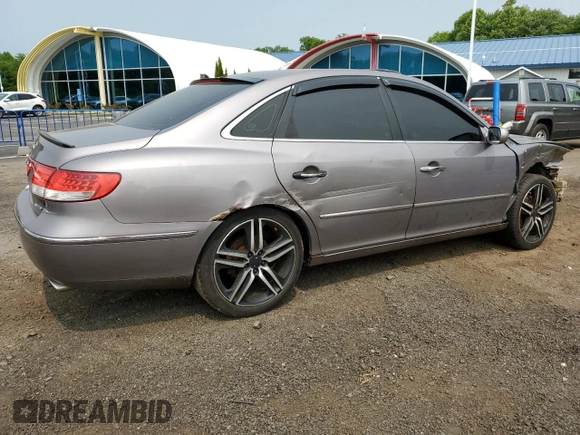 2006 Hyundai Azera SE with VIN KMHFC46F46A105028, listed as a Copart auction lot 59569815 with 219,201 mi miles and Salvage title. Bid and sale history available at DreamBid. Image 3.