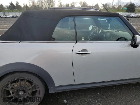 2013 MINI Convertible S with VIN WMWZP3C55DT297215, listed as a Copart auction lot 87995095 with Not provided miles and Salvage title. Bid and sale history available at DreamBid. Image 10.