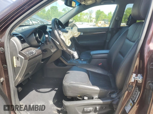2012 Kia Sorento SX z VIN 5XYKWDA29CG301363, wystawiony jako Copart lot #55954815 z przebiegiem 83 206 mil mil oraz Szkoda całkowita • Salvage title. Historia ofert i sprzedaży dostępna na DreamBid. Obrazek 7.