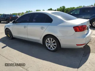 2012 Volkswagen Jetta PZEV with VIN 3VW4A7AJXCM123009, listed as a Copart auction lot 63573145 with 242,860 mi miles and Clean title. Bid and sale history available at DreamBid. Image 2.