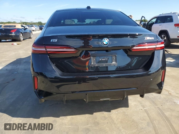 2024 BMW i5 M60 z VIN WBY43FK00RCP12947, wystawiony jako Copart lot #73754024 z przebiegiem Nie podano mil oraz Szkoda całkowita • Salvage title. Historia ofert i sprzedaży dostępna na DreamBid. Obrazek 6.
