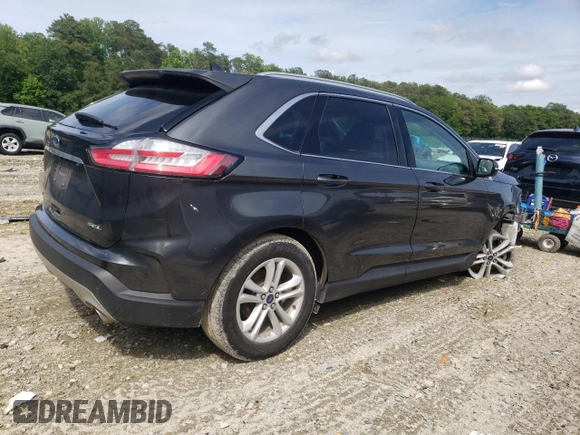 2020 Ford Edge SEL с VIN 2FMPK3J97LBB39094, выставлен на аукционе Copart как лот 58571215 с пробегом 95 329 миль миль и Списание • Salvage title. История ставок и продаж доступна на DreamBid. Изображение 3.