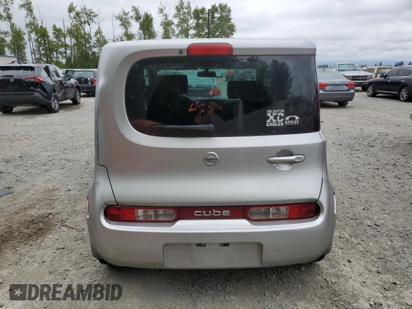 2011 Nissan Cube S z VIN JN8AZ2KR7BT203409, wystawiony jako Copart lot #57001145 z przebiegiem 127 446 mil mil oraz Tytuł czysty. Historia ofert i sprzedaży dostępna na DreamBid. Obrazek 6.