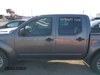 2021 Nissan Frontier SV with VIN 1N6ED0EB2MN702654, listed as a IAAI auction lot 42227414 with 142,309 mi miles and . Bid and sale history available at DreamBid. Image 15.