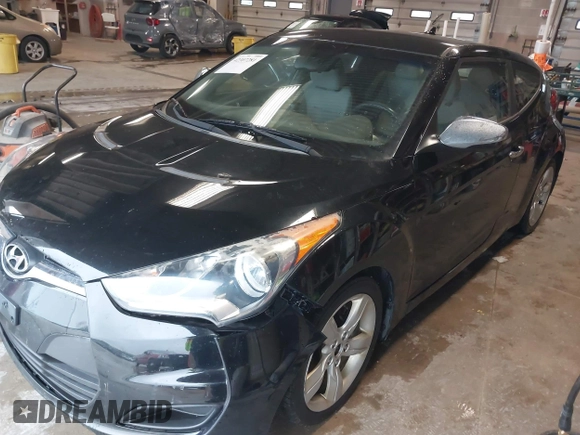 2012 Hyundai Veloster w/Gray Int с VIN KMHTC6AD3CU020230, выставлен на аукционе IAAI как лот 42307281 с пробегом 185 002 миль миль и . История ставок и продаж доступна на DreamBid. Изображение 2.