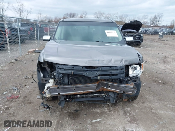 2009 Ford Flex SEL z VIN 2FMDK52CX9BA27679, wystawiony jako IAAI lot #41863371 z przebiegiem 170 993 mil mil oraz . Historia ofert i sprzedaży dostępna na DreamBid. Obrazek 13.