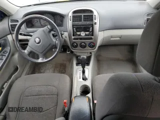 2006 Kia Spectra with VIN KNAFE162X65259727, listed as a Copart auction lot 75470994 with 0 mi miles and Salvage Title. Bid and sale history available at carsss.com. Image 8.