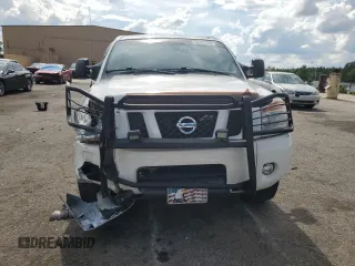 2012 Nissan Titan SV z VIN 1N6BA0EC2CN309207, wystawiony jako Copart lot #60451435 z przebiegiem 124 900 mil mil oraz Szkoda całkowita • Salvage title. Historia ofert i sprzedaży dostępna na DreamBid. Obrazek 5.