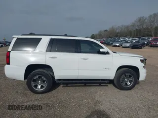 2017 Chevrolet Tahoe LT with VIN 1GNSKBKCXHR350028, listed as a IAAI auction lot 41684954 with 117,261 mi miles and . Bid and sale history available at DreamBid. Image 14.