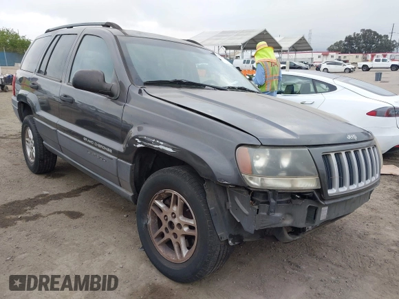 2004 Jeep Grand Cherokee Laredo with VIN 1J4GX48S34C214485, listed as a IAAI auction lot 42208120 with 164,322 mi miles and . Bid and sale history available at DreamBid. Image 1.