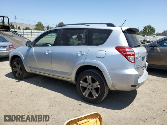 2010 Toyota RAV4 Sport with VIN JTMWF4DVXA5028981, listed as a Copart auction lot 60931165 with 214,075 mi miles and Salvage title. Bid and sale history available at DreamBid. Image 2.
