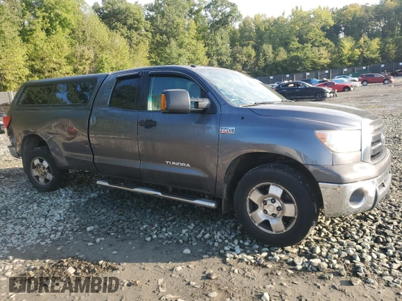 2013 Toyota Tundra 4WD Truck with VIN 5TFCY5F14DX015486, listed as a Copart auction lot 72344724 with 242,231 mi miles and Salvage Title. Bid and sale history available at carsss.com. Image 4.