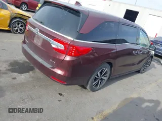 2018 Honda Odyssey Elite with VIN 5FNRL6H94JB067479, listed as a IAAI auction lot 42100911 with 160,174 mi miles and . Bid and sale history available at DreamBid. Image 4.