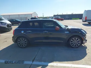 2015 MINI Hardtop 4 Door S with VIN WMWXU3C57FT892179, listed as a IAAI auction lot 42092010 with 95,156 mi miles and . Bid and sale history available at DreamBid. Image 14.