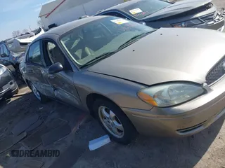 2004 Ford Taurus SE with VIN 1FAFP532X4G152810, listed as a IAAI auction lot 41639876 with 98,718 mi miles and . Bid and sale history available at DreamBid. Image 1.