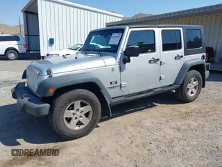 2008 Jeep Wrangler Unlimited X with VIN 1J4GA39168L592999, listed as a IAAI auction lot 42699909 with 158,128 mi miles and . Bid and sale history available at DreamBid. Image 2.