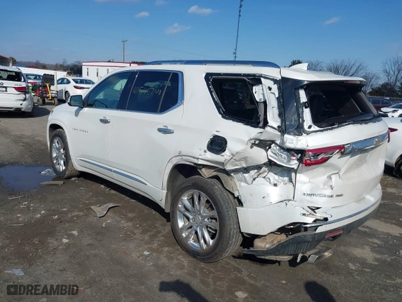 2021 Chevrolet Traverse High Country with VIN 1GNEVNKW9MJ200257, listed as a IAAI auction lot 41545240 with 72,842 mi miles. Bid and sale history available at carsss.com. Image 3.