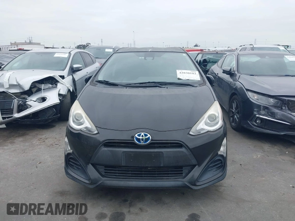 2017 Toyota Prius One with VIN JTDKDTB32H1597017, listed as a IAAI auction lot 42030182 with 56,461 mi miles and . Bid and sale history available at carsss.com. Image 12.