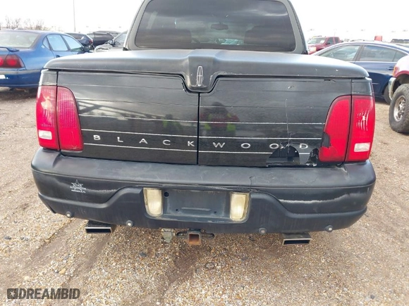 2002 Lincoln Blackwood with VIN 5LTEW05A02KJ01579, listed as a IAAI auction lot 41408693 with NaN miles. Bid and sale history available at carsss.com. Image 6.