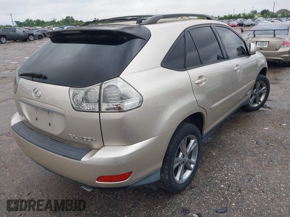 2006 Lexus RX 400h with VIN JTJHW31U060004642, listed as a IAAI auction lot 42207589 with 158,506 mi miles and . Bid and sale history available at DreamBid. Image 4.