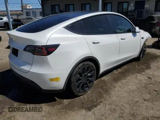 2022 Tesla Model Y Long Range z VIN 7SAYGDEEXNF455766, wystawiony jako Copart lot #49641685 z przebiegiem 51 142 mil mil oraz Szkoda całkowita • Salvage title. Historia ofert i sprzedaży dostępna na DreamBid. Obrazek 3.