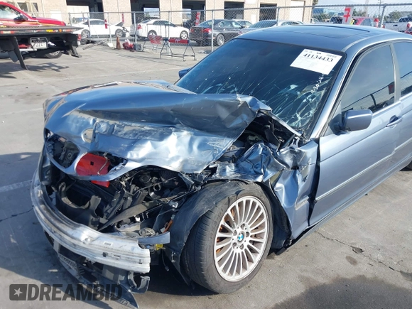 2003 BMW 3 Series 330i with VIN WBAEV53453KM03321, listed as a IAAI auction lot 41134433 with 186,586 mi miles. Bid and sale history available at carsss.com. Image 6.