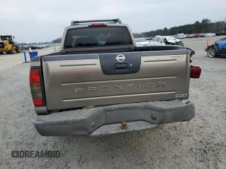 2004 Nissan Frontier XE with VIN 1N6ED29X64C478172, listed as a Copart auction lot 49031985 with 210,354 mi miles and Salvage title. Bid and sale history available at DreamBid. Image 6.
