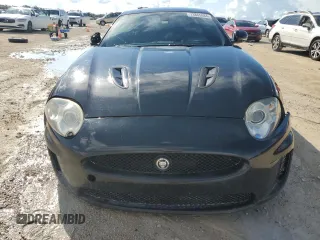 2010 Jaguar XK with VIN SAJWA4DC1AMB38762, listed as a Copart auction lot 73865884 with 98,030 mi miles and Salvage Title. Bid and sale history available at carsss.com. Image 5.