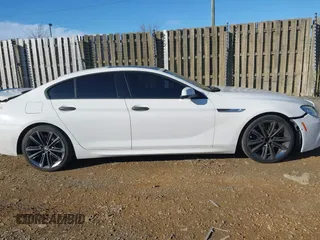 2015 BMW 6 Series 650i with VIN WBA6B2C54FGB99173, listed as a IAAI auction lot 41692594 with 123,664 mi miles and . Bid and sale history available at carsss.com. Image 14.