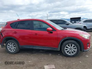 2014 Mazda CX-5 Touring with VIN JM3KE2CY3E0355296, listed as a IAAI auction lot 41688625 with 164,390 mi miles. Bid and sale history available at carsss.com. Image 13.