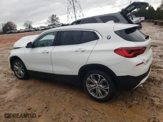 2020 BMW X2 sDrive28i with VIN WBXYH9C08L5P33368, listed as a Copart auction lot 69129512 with 66,918 mi miles. Bid and sale history available at carsss.com. Image 2.