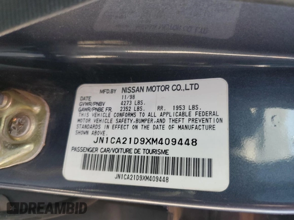 1999 Nissan Maxima GXE z VIN JN1CA21D9XM409448, wystawiony jako Copart lot #51822895 z przebiegiem Nie podano mil oraz Szkoda całkowita • Salvage title. Historia ofert i sprzedaży dostępna na DreamBid. Obrazek 14.