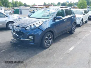 2021 Kia Sportage EX z VIN KNDPNCAC4M7897590, wystawiony jako IAAI lot #42183678 z przebiegiem 110 657 mil mil oraz . Historia ofert i sprzedaży dostępna na DreamBid. Obrazek 2.