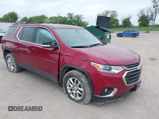 2021 Chevrolet Traverse LT Cloth with VIN 1GNEVGKW2MJ110055, listed as a IAAI auction lot 42319873 with 91,896 mi miles and . Bid and sale history available at DreamBid. Image 1.
