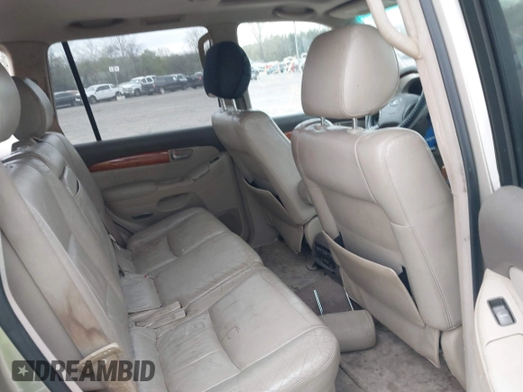 2003 Lexus GX 470 z VIN JTJBT20X230003105, wystawiony jako IAAI lot #42063855 z przebiegiem 204 004 mil mil oraz . Historia ofert i sprzedaży dostępna na DreamBid. Obrazek 8.