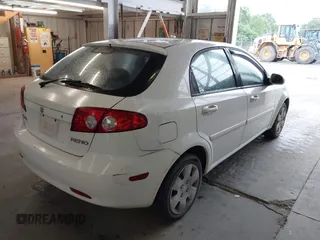 2007 Suzuki Reno z VIN KL5JD66Z17K488607, wystawiony jako IAAI lot #42224082 z przebiegiem 199 177 mil mil oraz . Historia ofert i sprzedaży dostępna na DreamBid. Obrazek 4.
