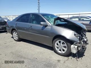 2005 Toyota Camry LE with VIN 4T1BE30K15U502945, listed as a Copart auction lot 62761625 with 235,877 mi miles and Salvage title. Bid and sale history available at DreamBid. Image 4.