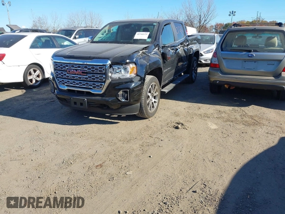 2021 GMC Canyon 4WD Denali z VIN 1GTG6EEN9M1240596, wystawiony jako IAAI lot #40760124 z przebiegiem 52 985 mil mil oraz . Historia ofert i sprzedaży dostępna na DreamBid. Obrazek 22.