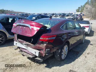 2015 Toyota Avalon Limited with VIN 4T1BK1EB0FU190530, listed as a IAAI auction lot 41727767 with 141,861 mi miles and . Bid and sale history available at DreamBid. Image 4.