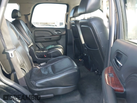 2009 Cadillac Escalade z VIN 1GYFK13289R242884, wystawiony jako IAAI lot #41320982 z przebiegiem 132 983 mil mil oraz . Historia ofert i sprzedaży dostępna na DreamBid. Obrazek 8.