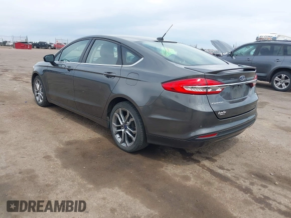 2017 Ford Fusion SE z VIN 3FA6P0H76HR354078, wystawiony jako IAAI lot #42103550 z przebiegiem 103 201 mil mil oraz . Historia ofert i sprzedaży dostępna na DreamBid. Obrazek 3.