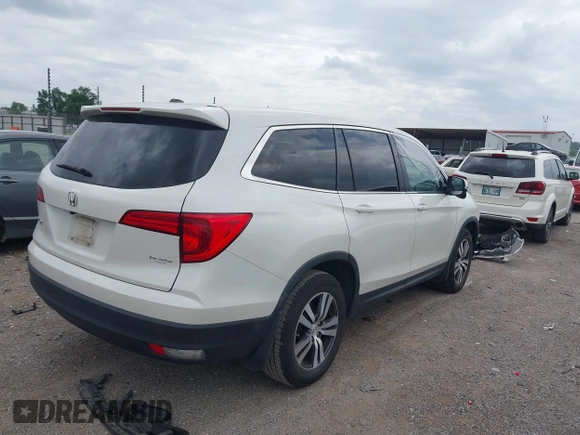 2018 Honda Pilot EX-L with VIN 5FNYF5H55JB016471, listed as a IAAI auction lot 42397519 with 102,482 mi miles and . Bid and sale history available at DreamBid. Image 4.