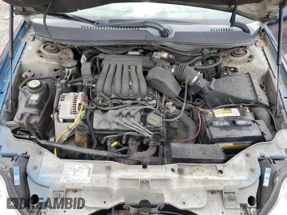 2003 Mercury Sable GS z VIN 1MEFM50U83G602556, wystawiony jako Copart lot #61019515 z przebiegiem 94 998 mil mil oraz Czysty tytuł • Clean title. Historia ofert i sprzedaży dostępna na DreamBid. Obrazek 11.