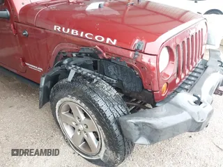 2010 Jeep Wrangler Unlimited Rubicon z VIN 1J4HA6H18AL180628, wystawiony jako IAAI lot #42110357 z przebiegiem 217 940 mil mil oraz . Historia ofert i sprzedaży dostępna na DreamBid. Obrazek 6.
