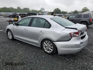 2011 Volkswagen Jetta SE with VIN 3VWDZ7AJ5BM319091, listed as a Copart auction lot 57991585 with 185,458 mi miles and Salvage title. Bid and sale history available at DreamBid. Image 2.