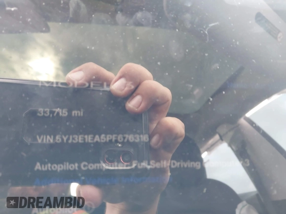 2023 Tesla Model 3 with VIN 5YJ3E1EA5PF676316, listed as a IAAI auction lot 42384765 with 33,715 mi miles and . Bid and sale history available at DreamBid. Image 7.
