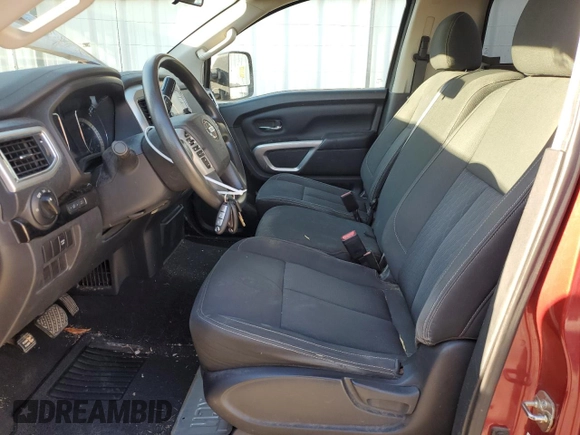 2017 Nissan Titan with VIN 1N6BA1R97HN520169, listed as a Copart auction lot 82783774 with 203,684 mi miles and Salvage title. Bid and sale history available at DreamBid. Image 7.