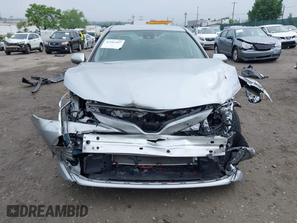 2019 Toyota Camry LE z VIN 4T1B11HK5KU813553, wystawiony jako IAAI lot #42282507 z przebiegiem 22 100 mil mil oraz . Historia ofert i sprzedaży dostępna na DreamBid. Obrazek 11.