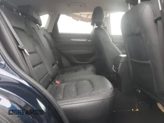 2021 Mazda CX-5 Grand Touring with VIN JM3KFBDM0M0391325, listed as a Copart auction lot 44863215 with 21,997 mi miles and Salvage Title. Bid and sale history available at DreamBid. Image 12.