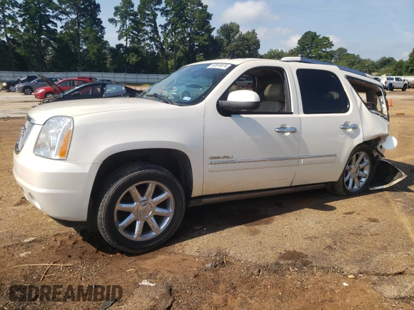 2013 GMC Yukon Denali with VIN 1GKS2EEF9DR311929, listed as a Copart auction lot 63810874 with 122,356 mi miles and Salvage Title. Bid and sale history available at carsss.com. Image 1.